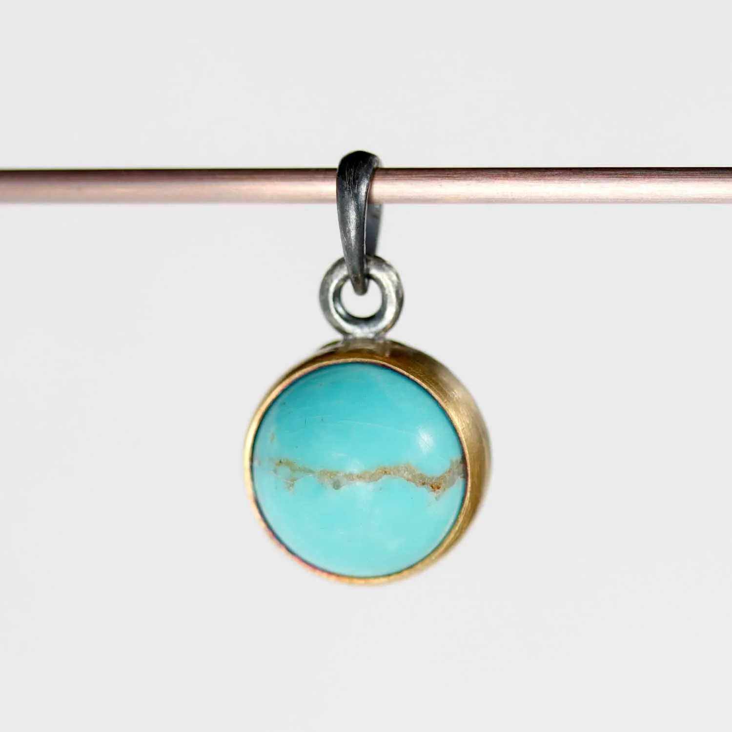 . Bezel-set Gold & Silver with Arizona Turquoise Pendant