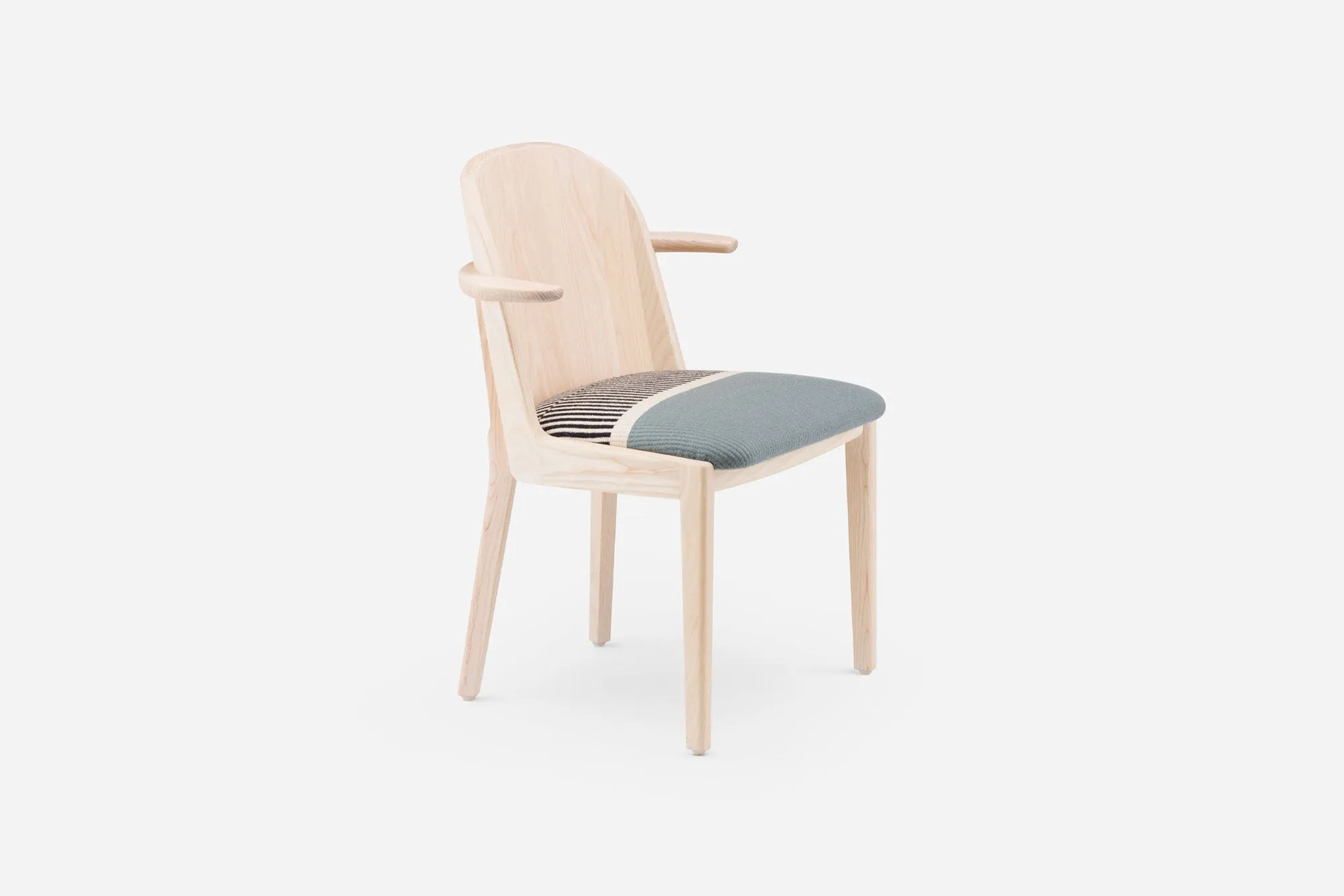 TWENTY-FIVE DINING ARMCHAIR WITH MANTA GIL UPHOLSTERY