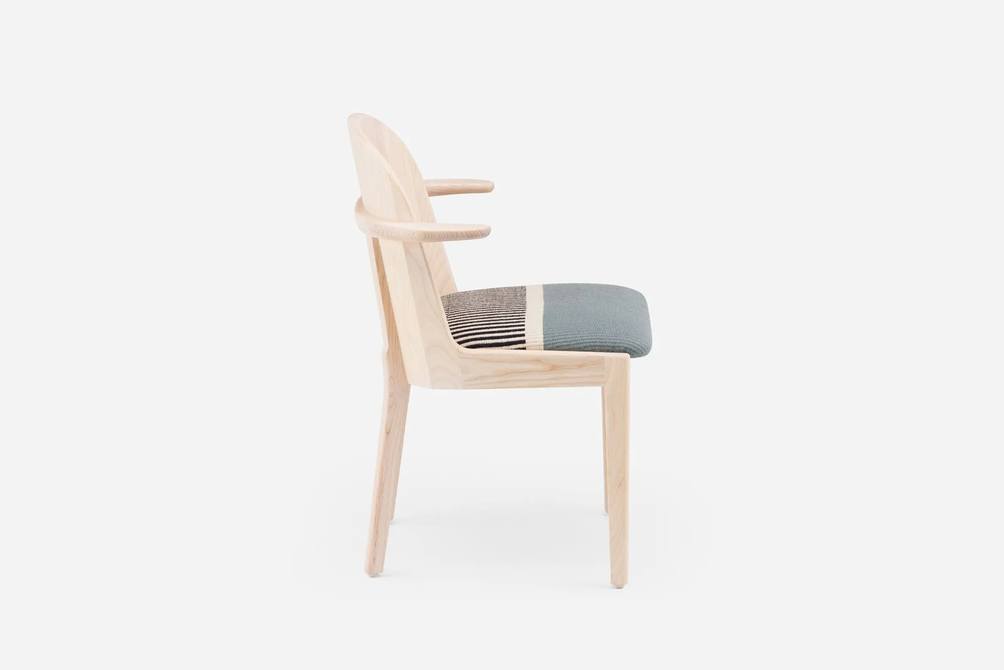 TWENTY-FIVE DINING ARMCHAIR WITH MANTA GIL UPHOLSTERY