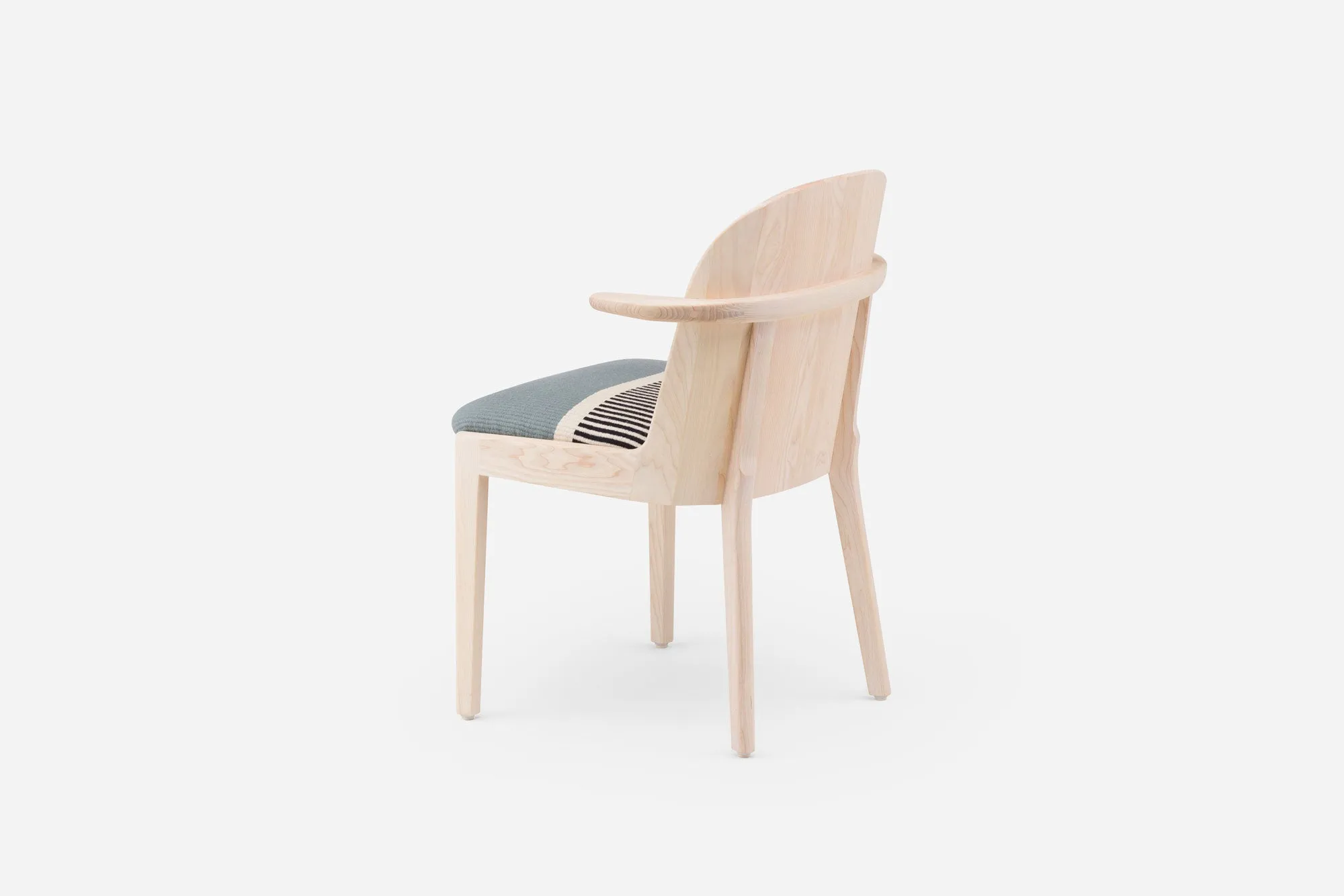 TWENTY-FIVE DINING ARMCHAIR WITH MANTA GIL UPHOLSTERY